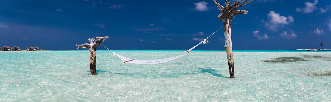 Hammock hanging over sea in Gili Lankanfushi island