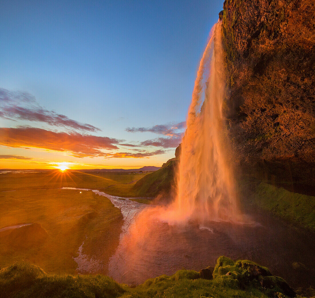 Big waterfall in Seljalandsfoss during the golden hour, Iceland