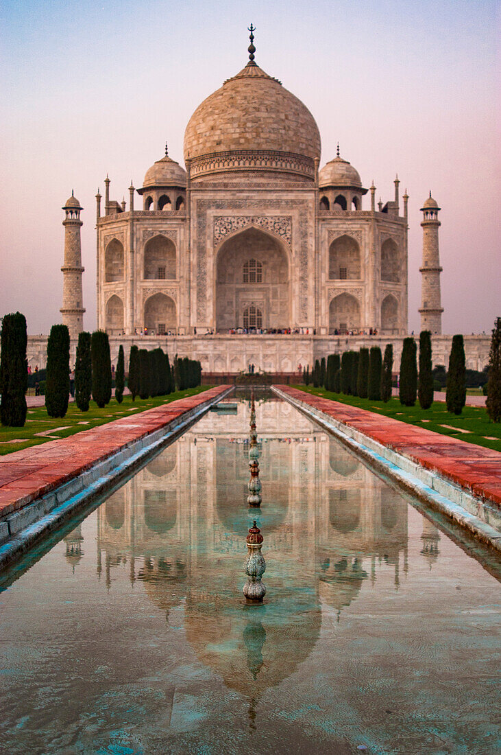 Reflection of a Taj Mahal at the pool in Agra, India