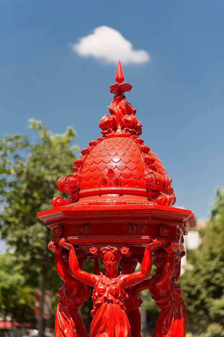France. Paris 13th district. Avenue d'Ivry. Red Wallace fountain