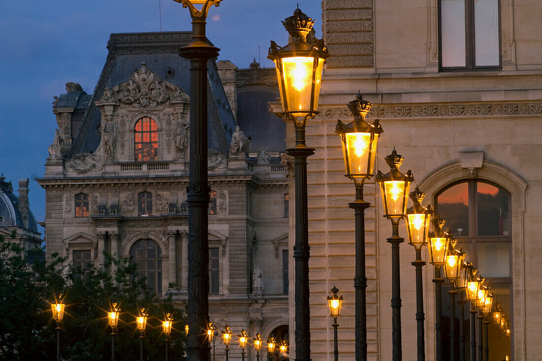 France, Paris, 1st district, Louvre museum, southern wing by the Jardin du Carrousel at night.
