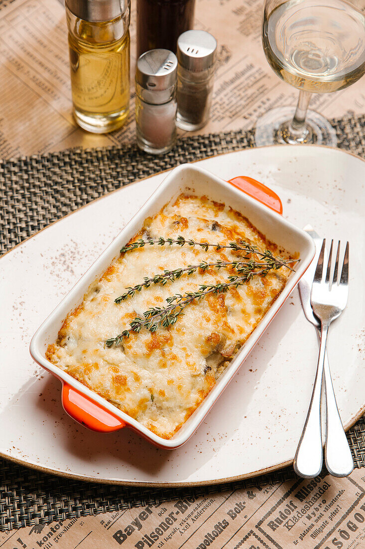 Rosemary on casserole in pan