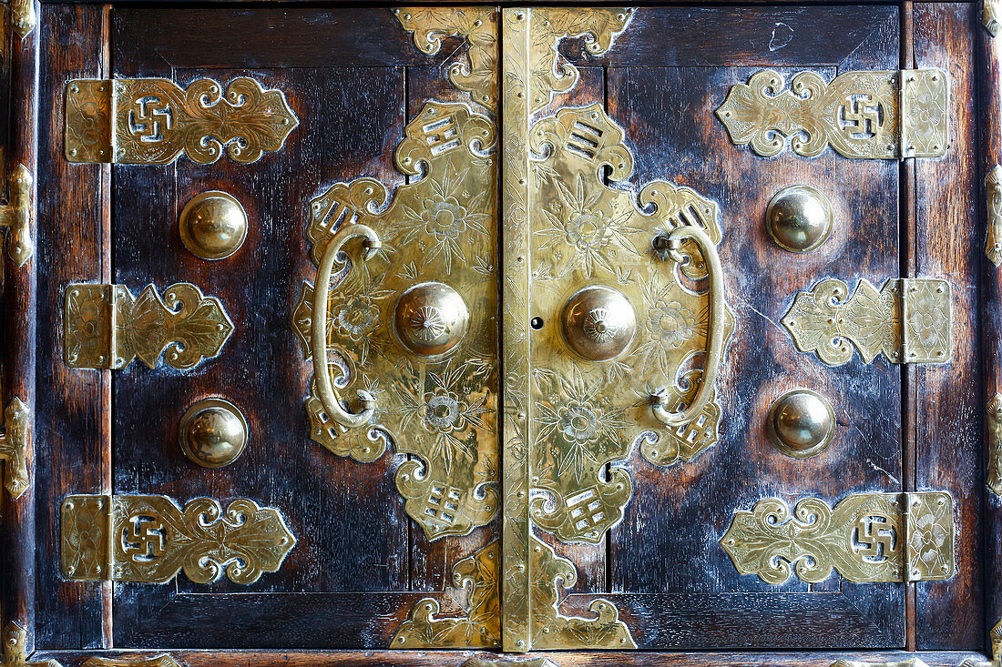 Ornate handles on doors