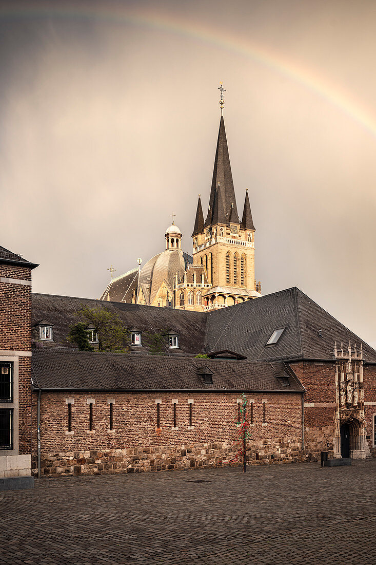 UNESCO World Heritage rainbow after thunderstorm above Aachen Cathedral, Aachen, North Rhine-Westphalia, Germany