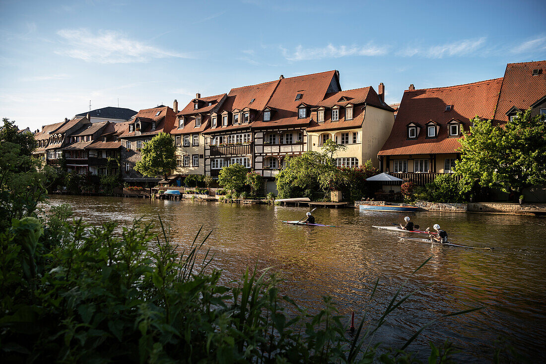 UNESCO World Heritage, Bamberg historic centre, kayak in front of little venice, Bamberg, Franconia, Bavaria, Germany