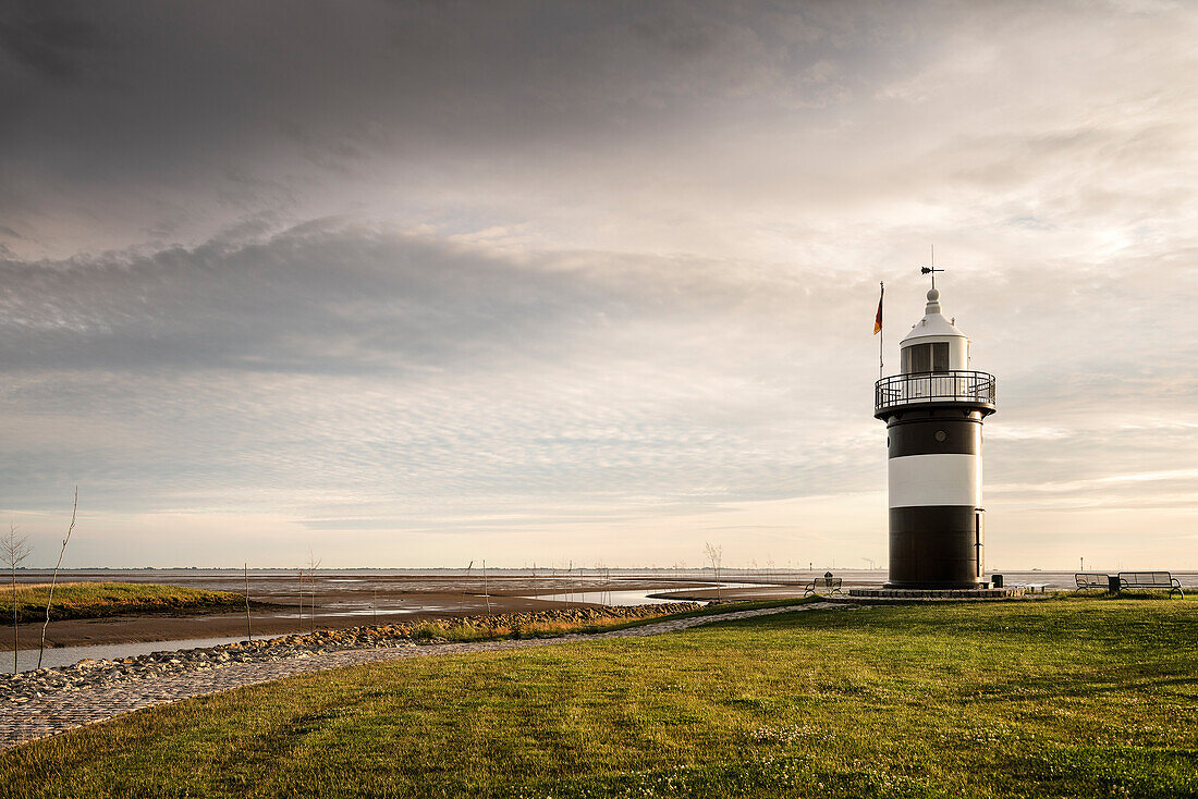 UNESCO World Heritage the Wadden Sea, lighthouse, intertidal estuarine mudflats at Wremen, Cuxhaven, Lower Saxony, Germany, North Sea
