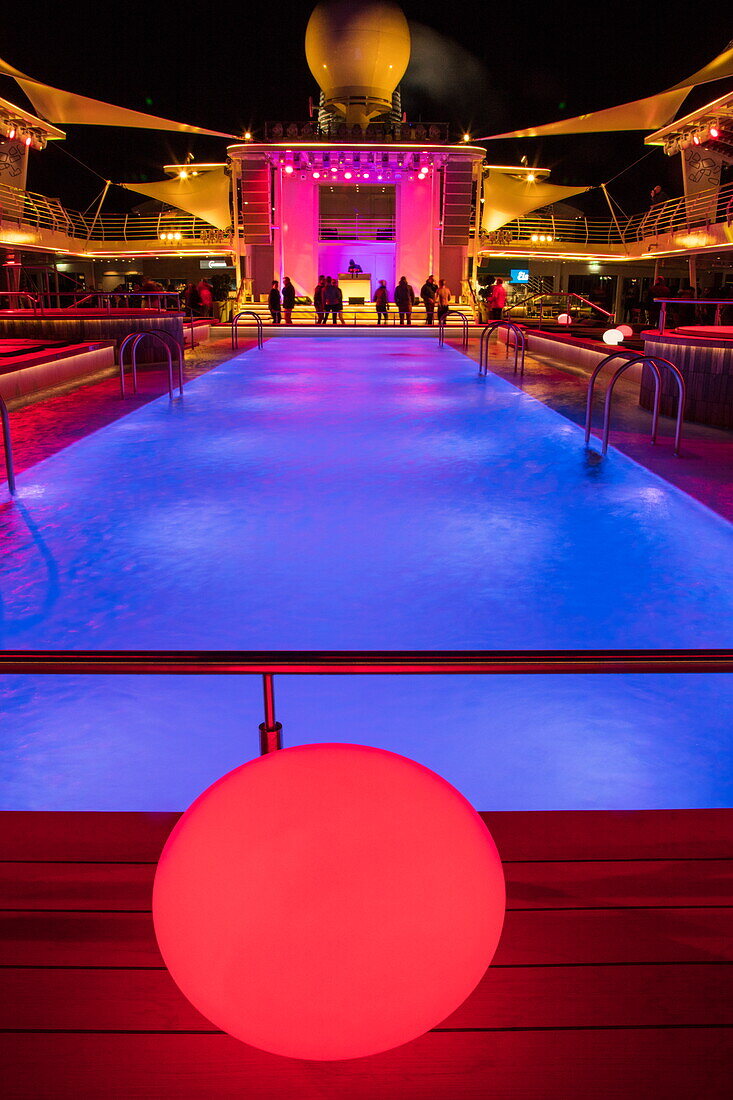 Lighting element during pool party on Pooldeck of cruise ship Mein Schiff 6 (TUI Cruises) at night, Baltic Sea, near Denmark