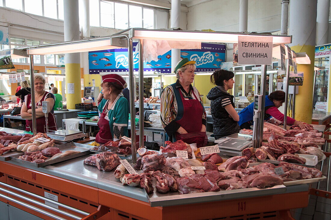 Women sell meat at Yaroslavl market, Yaroslavl, Russia