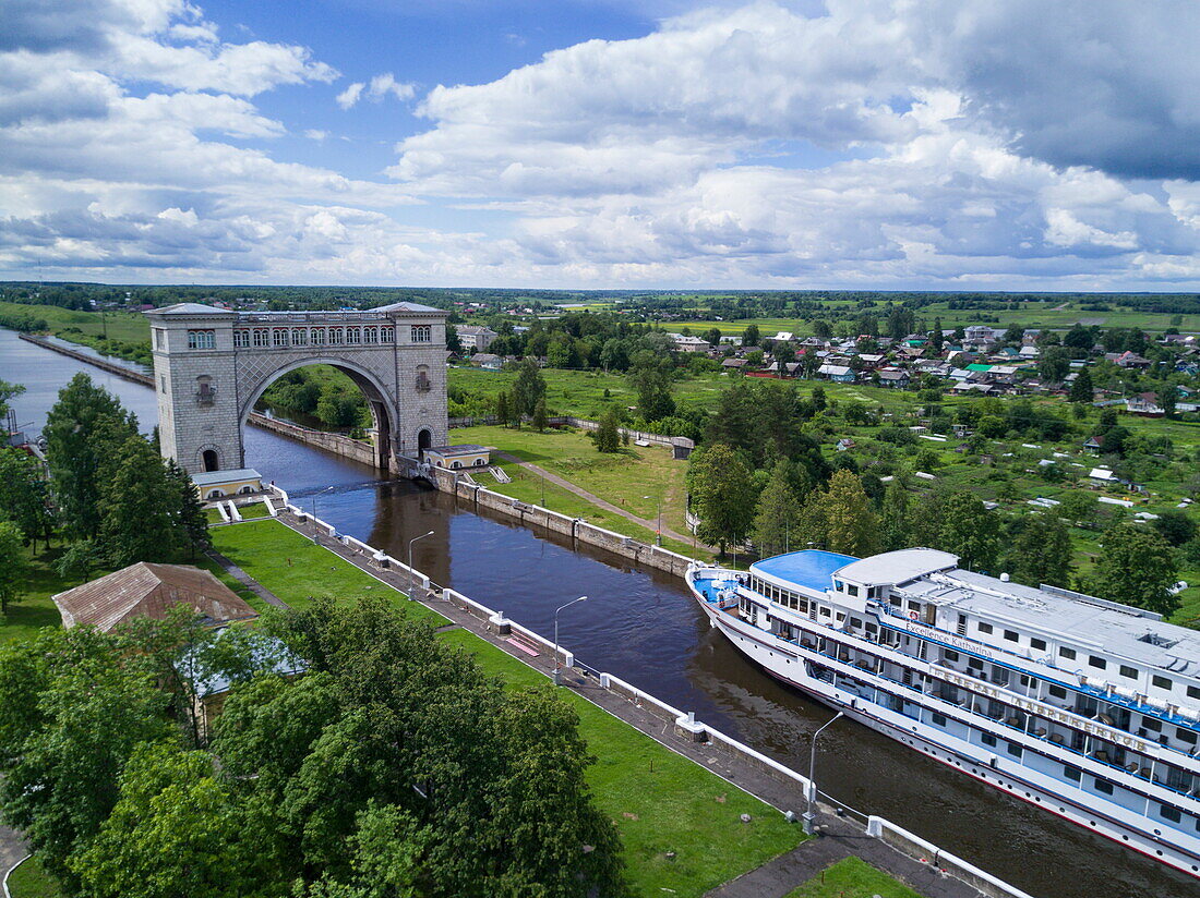 Aerial of river cruise ship Excellence Katharina of Reisebüro Mittelthurgau (formerly MS General Lavrinenkov) inside Uglich Lock on Volga river, Uglich, Russia