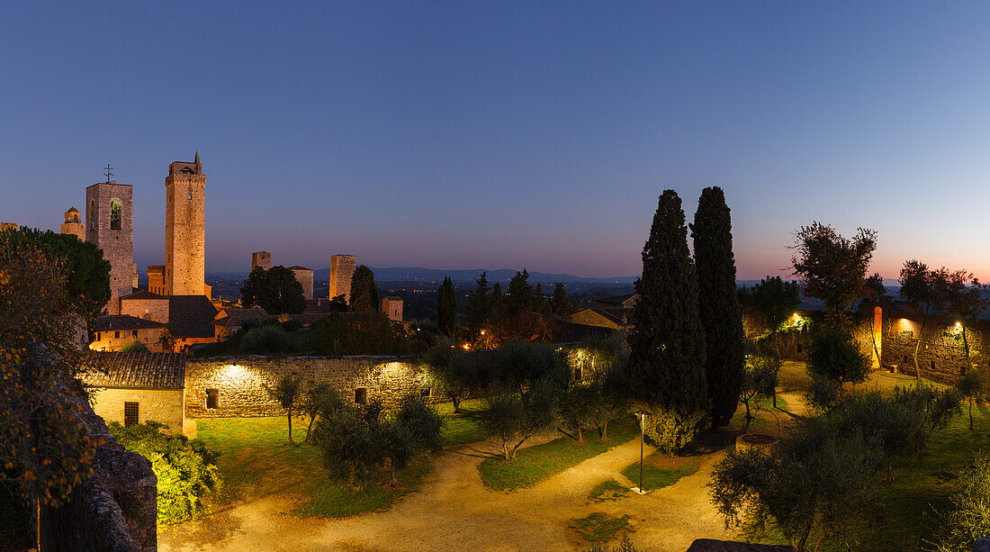 townscape with towers, view from the tower of Rocca castle, cypresses, San Gimignano, hilltown, UNESCO World Heritage Site, province of Siena, Tuscany, Italy, Europe