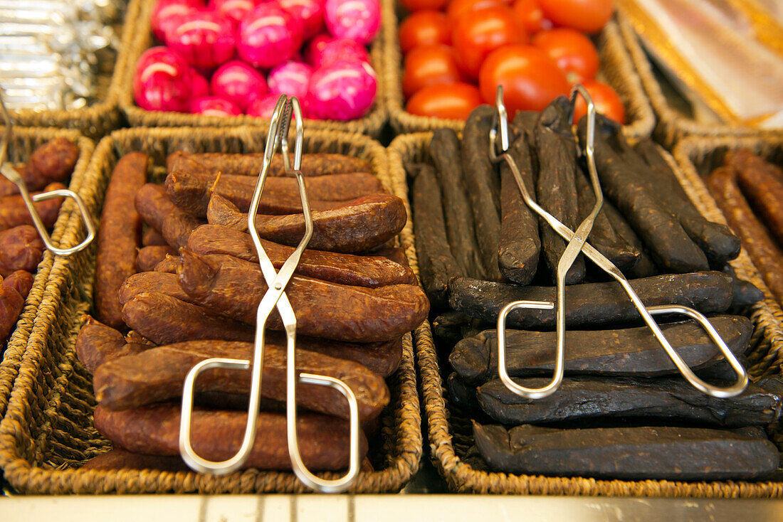 Landjäger, dried and smoked sausages are part of the food offerings at beer ardens, like at the beer garden at the Seehaus in the English Garden in Munich, Bavaria