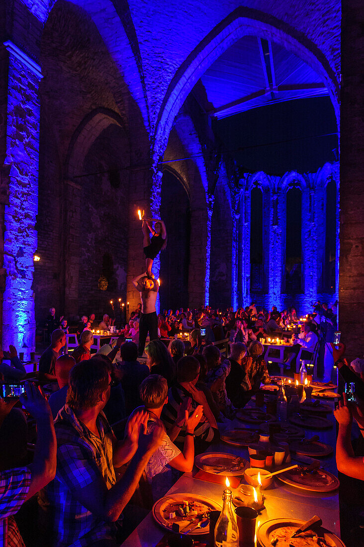 Medieval festival, medieval banquet with music and shows. Performance in the ruin St. Olof, Schweden