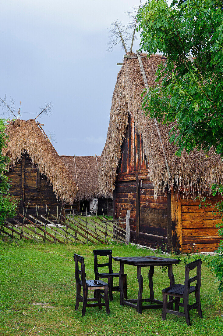 Wooden houses with thatched roof in the Bunge open-air museum, Schweden