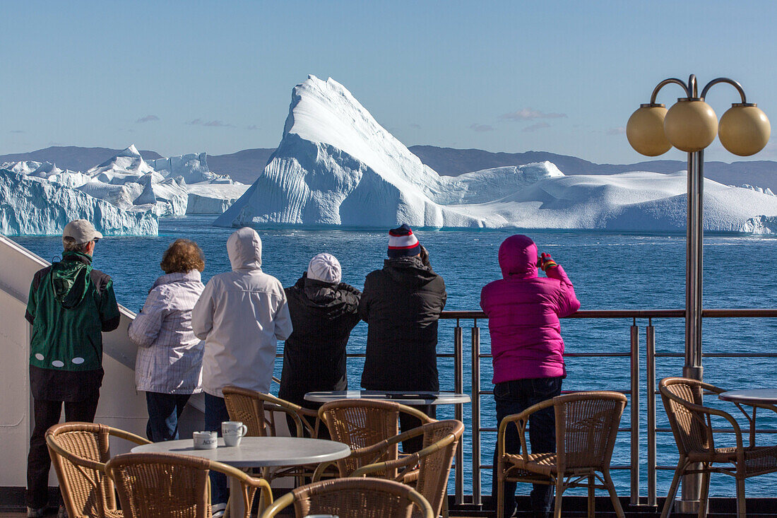 passengers aboard the astoria, discovery of the ice fjord, jakobshavn glacier, 65 kilometres long, coming from the inlandsis, sermeq kujalleq, ilulissat, greenland