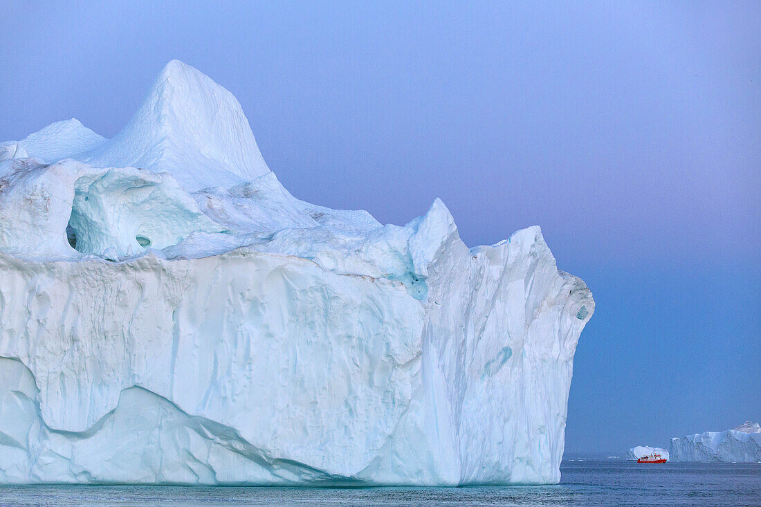 tourist sightseeing boat in the middle of the icebergs in the ice fjord, jakobshavn glacier, 65 kilometres long, coming from the inlandsis, sermeq kujalleq, ilulissat, greenland