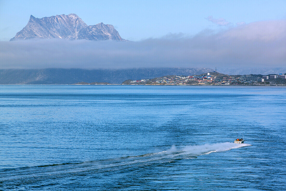 arriving at the city by way of the fjord, nuuk, greenland