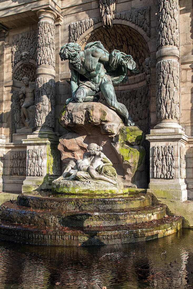 sculpture of polyphemus surprising galatea in the arms of acis, legendary cyclops in love with the sea goddess, medicis fountain, luxembourg gardens, paris (75), france