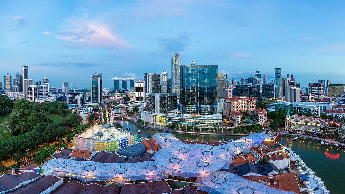 City skyline and riverside restaurants at the entertainment district of Clarke Quay, Singapore, Southeast Asia, Asia