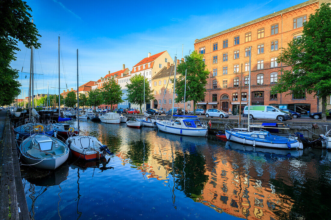 Boats moored in Christianshavn Canal, Copenhagen, Denmark, Europe