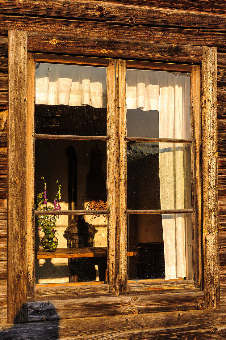 Wooden house with window in the open-air museum Skansen, Stockholm, Sweden