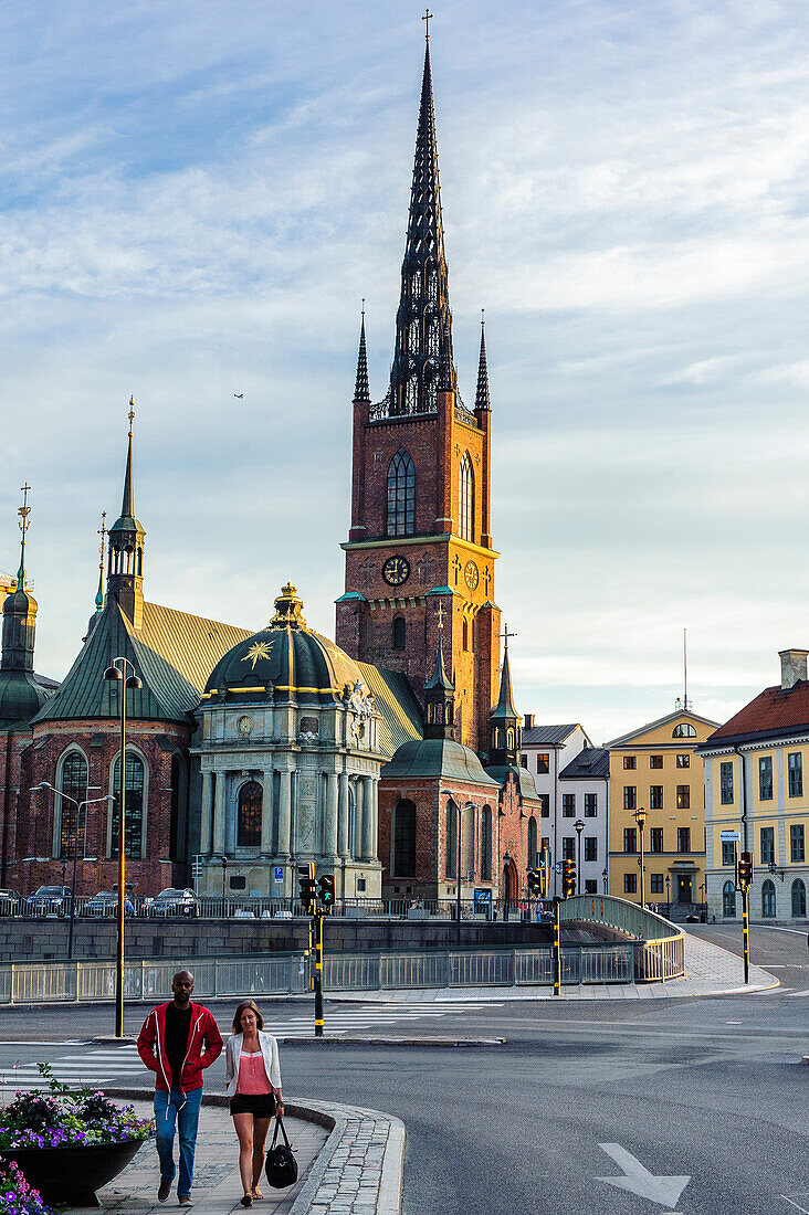 Pedestrians in front of the church Riddarholmskyrkan, Stockholm, Sweden