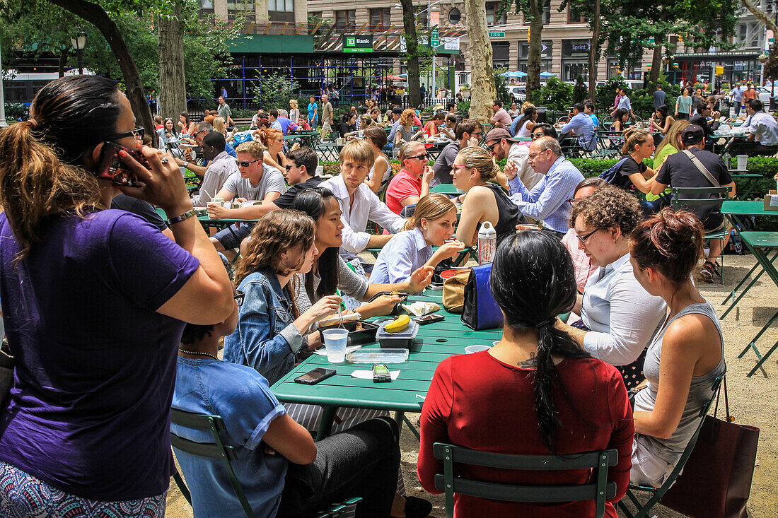 new yorkers and tourists having lunch at the burger specialist shake-shack in madison square park, flatiron district, manhattan, new york city, state of new york, united states, usa