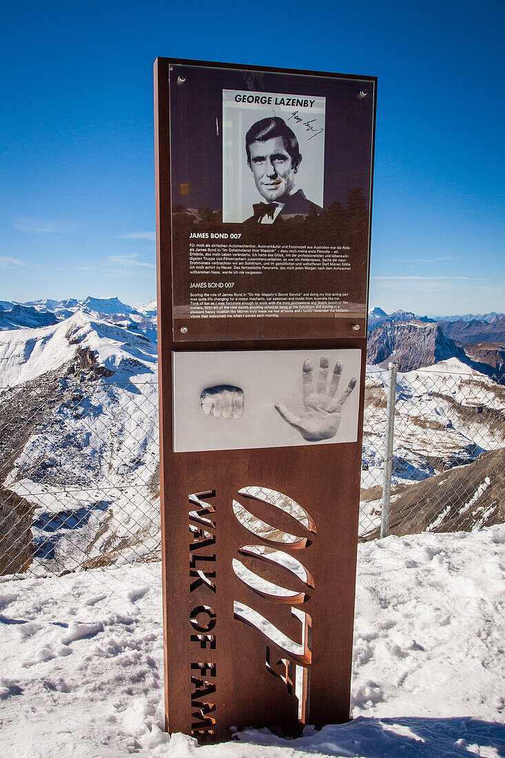 sign presenting george lazenby who played the role of james bond film on her majesty's secret, terrace of the restaurant at the summit of the schiltorn, piz gloria, bernese alps, canton of berne, switzerland