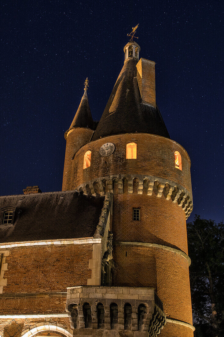 15th century red brick tower, night shot, chateau de maintenon (28), france