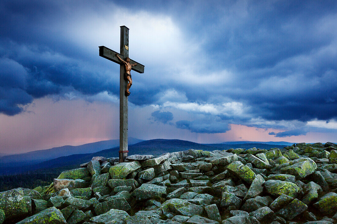 Thunderclouds above the summit cross on Lusen, Bavarian Forest, Bavaria, Germany