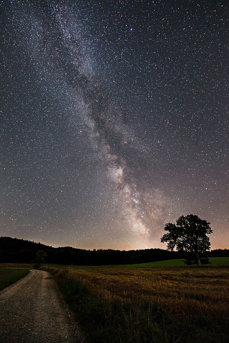 hiking at night under the starry sky close to Frieding, Bavaria, Germany