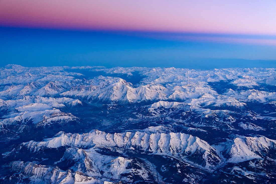 The Mont Blanc region under pink skies from a bird's-eye perspective, Chamonix, France