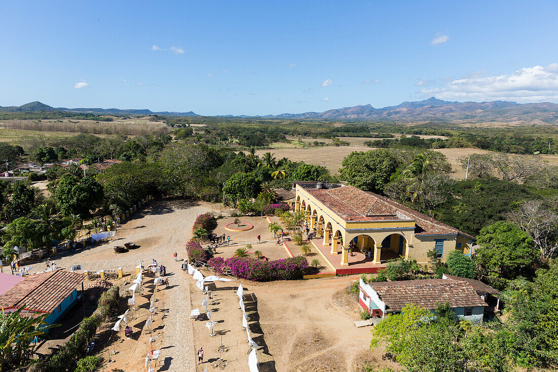 view from Manaca Iznaga tower, tour into the Valle de los Ingenios, formerly famous for sugarcane plantations, with a steam locomotive, family travel to Cuba, parental leave, holiday, time-out, adventure, near Trinidad, province Sancti Spiritus, Cuba, Car