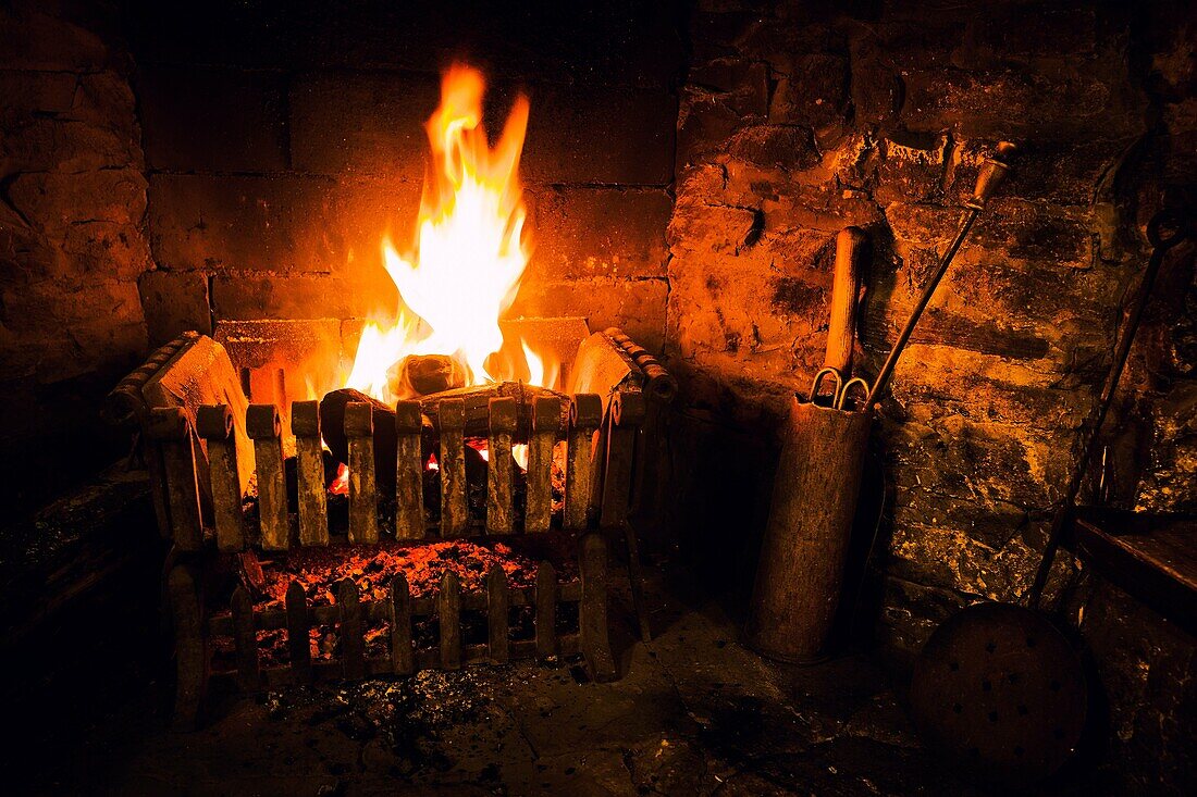 Fireplace in a pub. Starbotton, Skipton, Yorkshire Dales, North Yorkshire, England, UK.