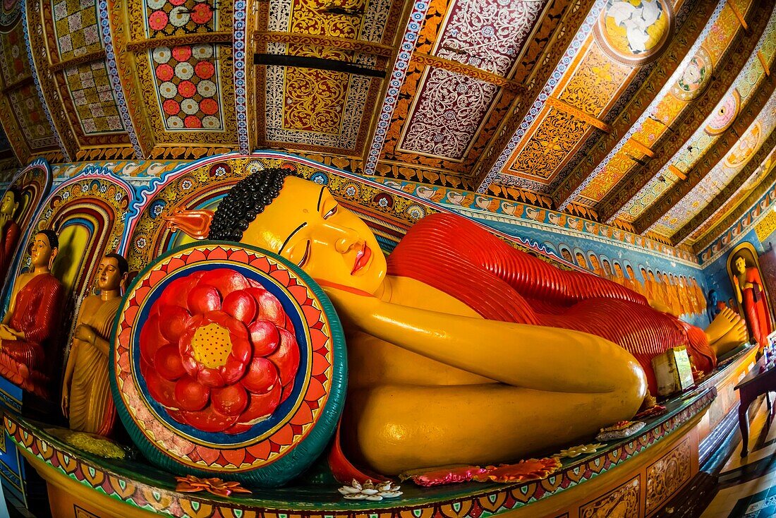 Reclining Buddha, Isurumuniya Temple, Anuradhapura, Sri Lanka, Anuradhapura is one of the ancient capitals of Sri Lanka, famous for its well-preserved ruins of an ancient Sri Lankan civilization