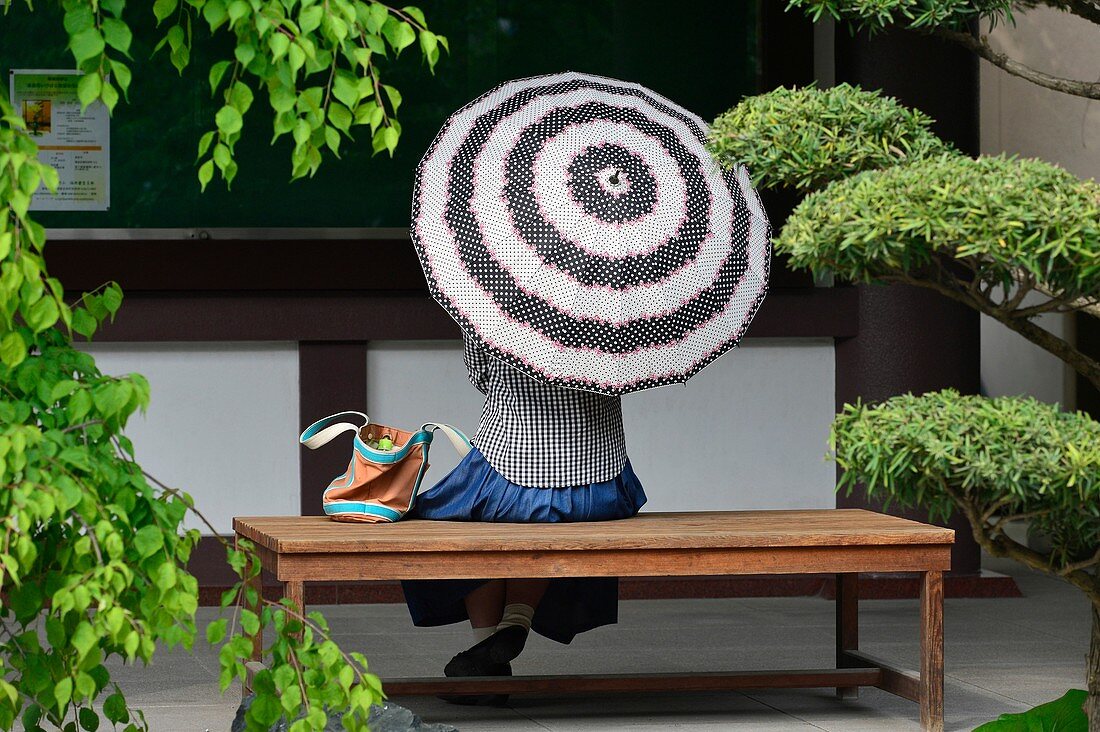 Woman with umbrella in Tochoji temple, Fukuoka, Japan, Asia