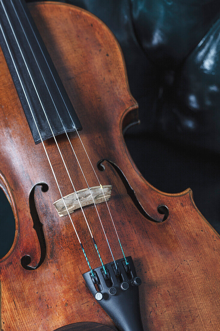 High angle close-up of violin on table