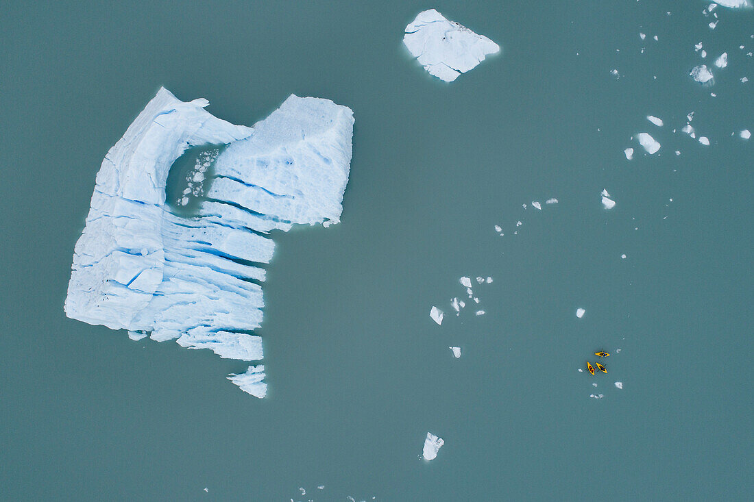 Aerial view of canoes and iceberg in lagoon, Lake Palmer, Anchorage, Alaska, USA