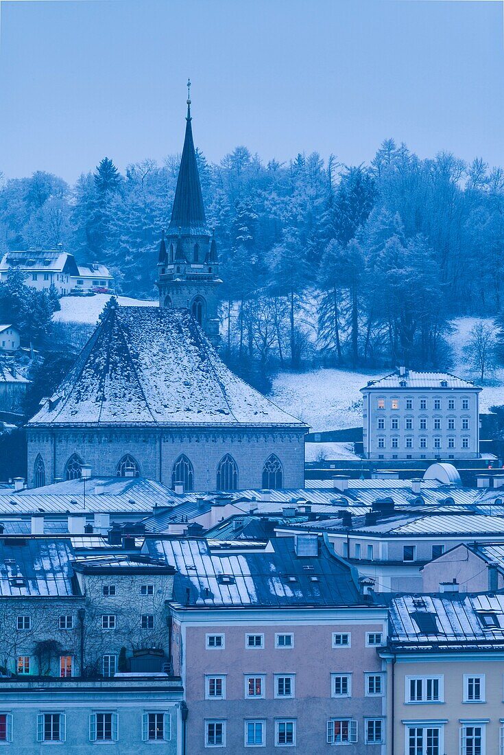 Austria, Salzburgerland, Salzburg, elevated city view from the kapuzinerberg, dawn, winter.