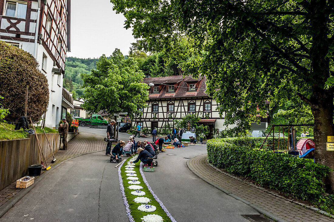 People arranging petals for the flower carpet, Corpus Christi, Feast of Corpus Christi, procession, Sipplingen, Lake Constance, Baden-Wuerttemberg, Germany, Europe