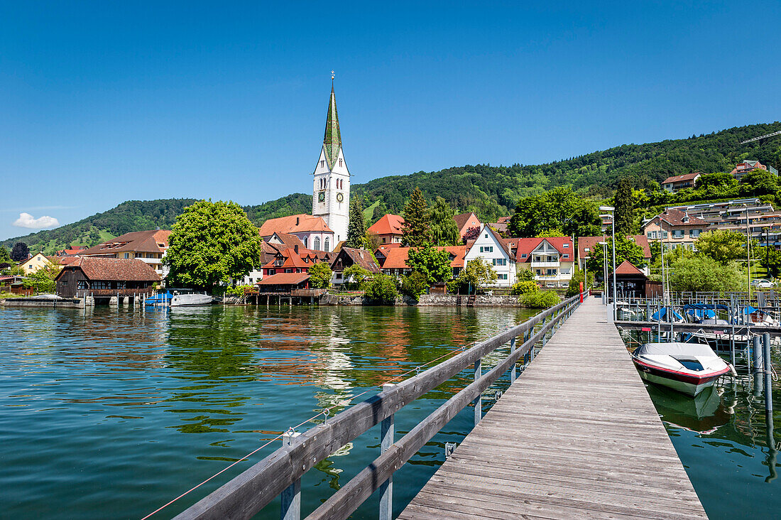 Village with church seen from lake Constance, Corpus Christi, Feast of Corpus Christi, Sipplingen, Lake Constance, Baden-Wuerttemberg, Germany, Europe