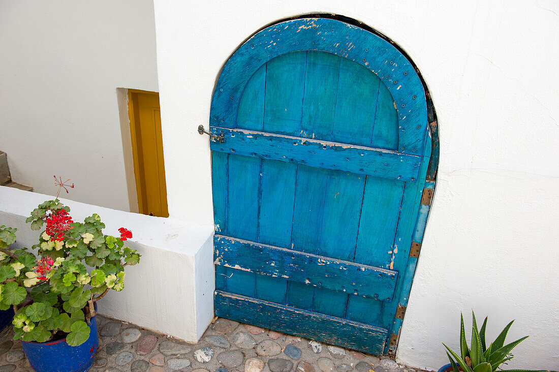 Blue door of a house in Plakias, Crete, Greece, Europe