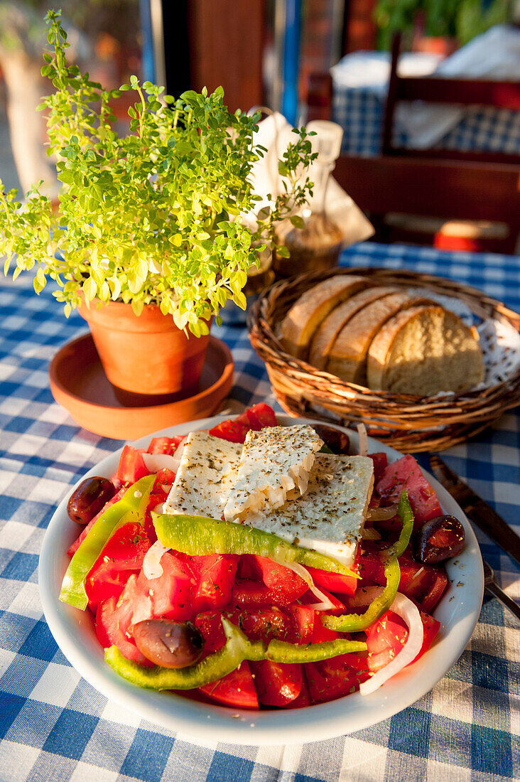 Greek food, tomato salad with fresh bread, Restaurant in Plakias, Crete, Greece, Europe