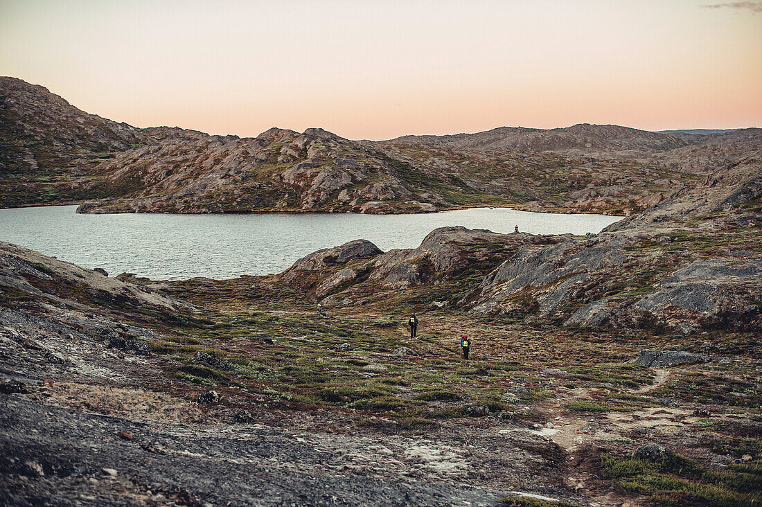 Hiker on a route through greenland, greenland, arctic.