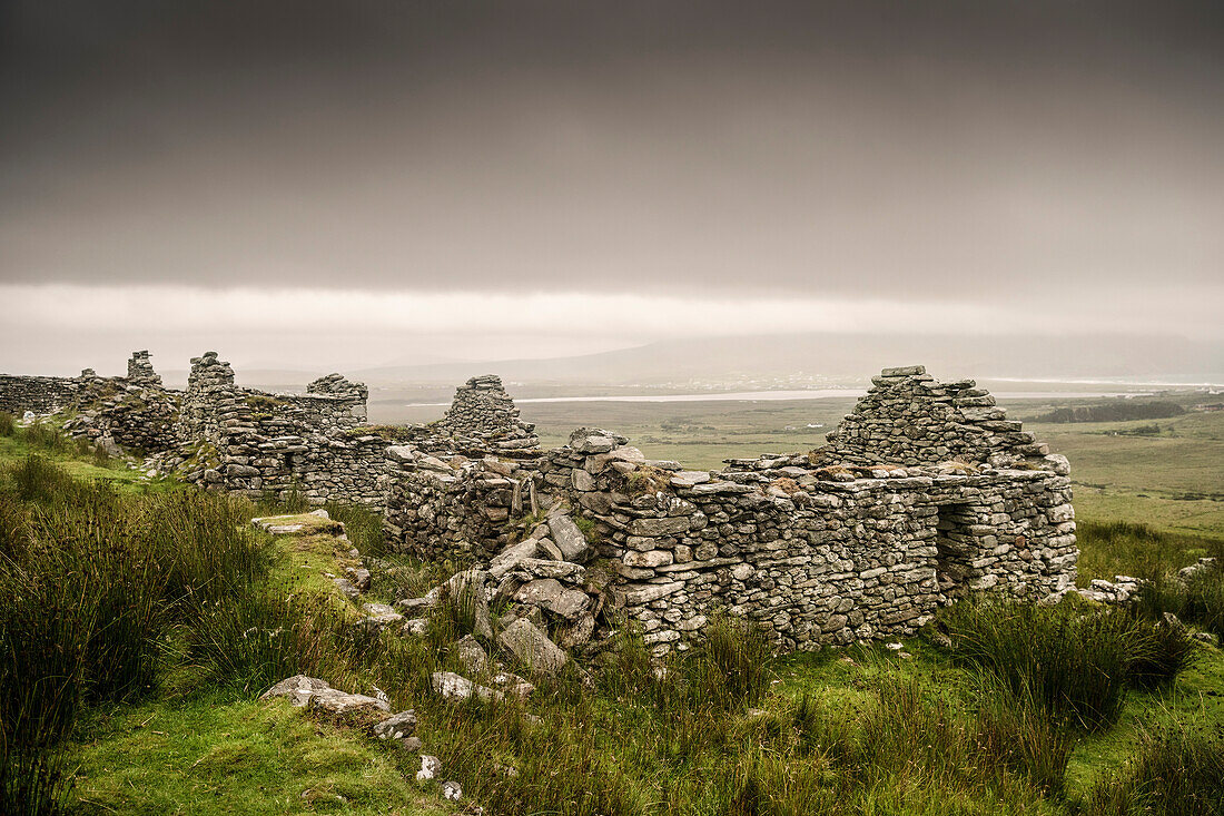 deserted and decayed stone houses at Slievemore (deserted village), Achill Island, County Mayo, Ireland, Wild Atlantic Way, Europe