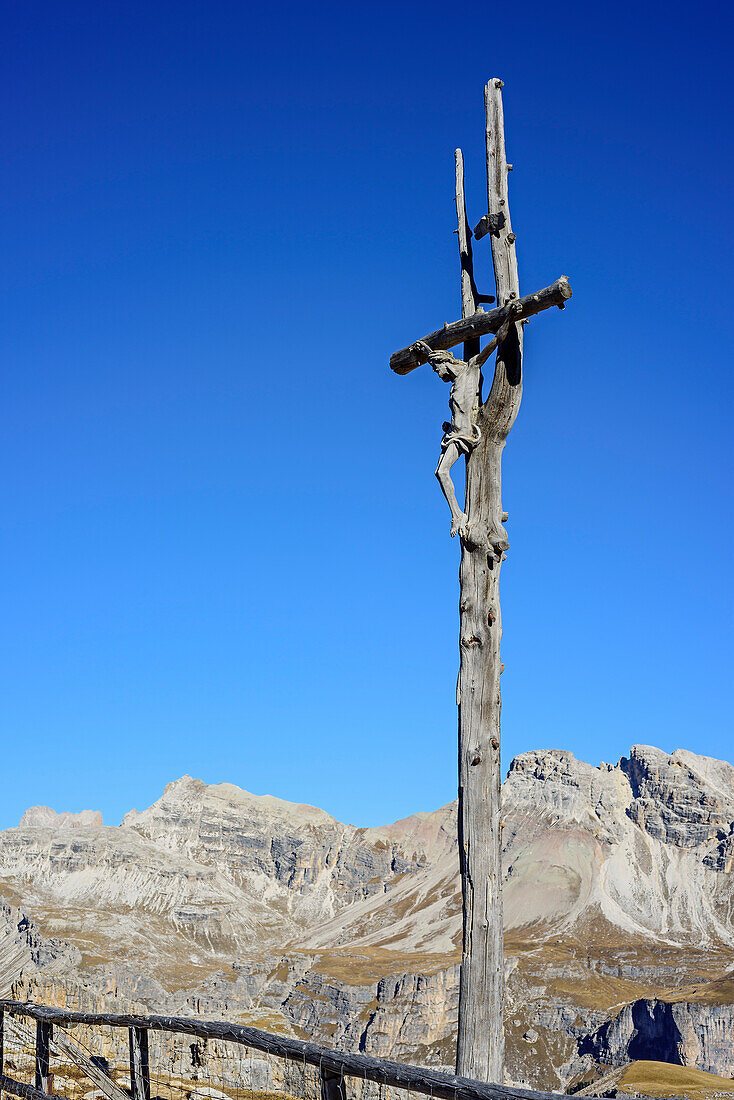 Wooden crucifix in Puez group, Dolomites, UNESCO World Heritage Site Dolomites, Venetia, Italy