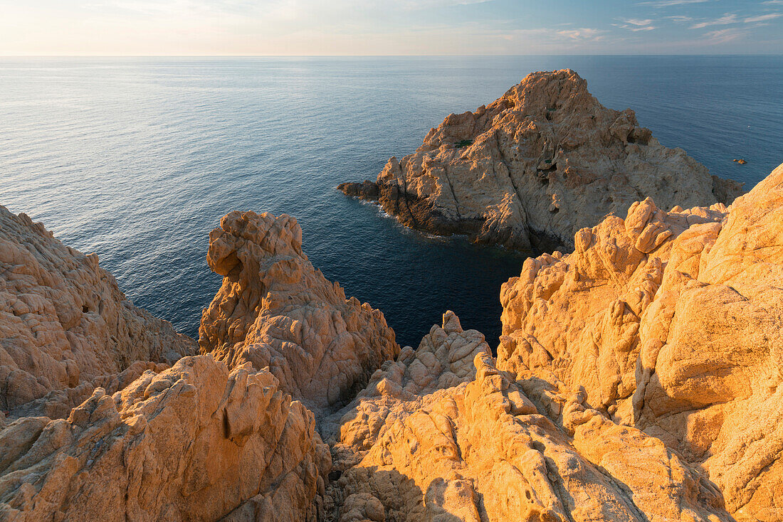 rocky coast at L'Ile Rousse, Corsica, France