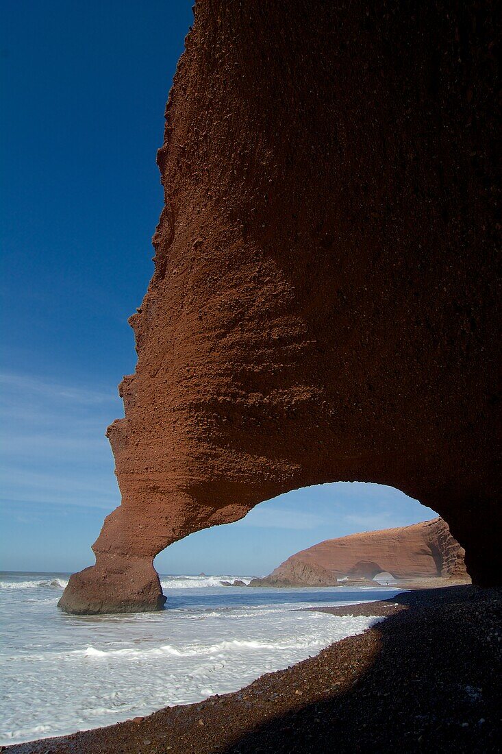 Steep escarpment with bizarre rock formations, Legzira near Sidi Ifni, Tiznit, Morocco