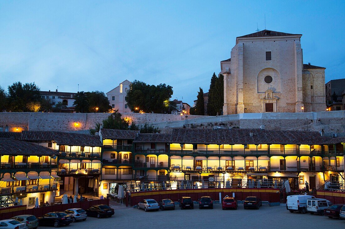 Plaza Mayor with Converted Bullring and Balconies, Church of Asuncion (background), Evening, Chinchon, Spain