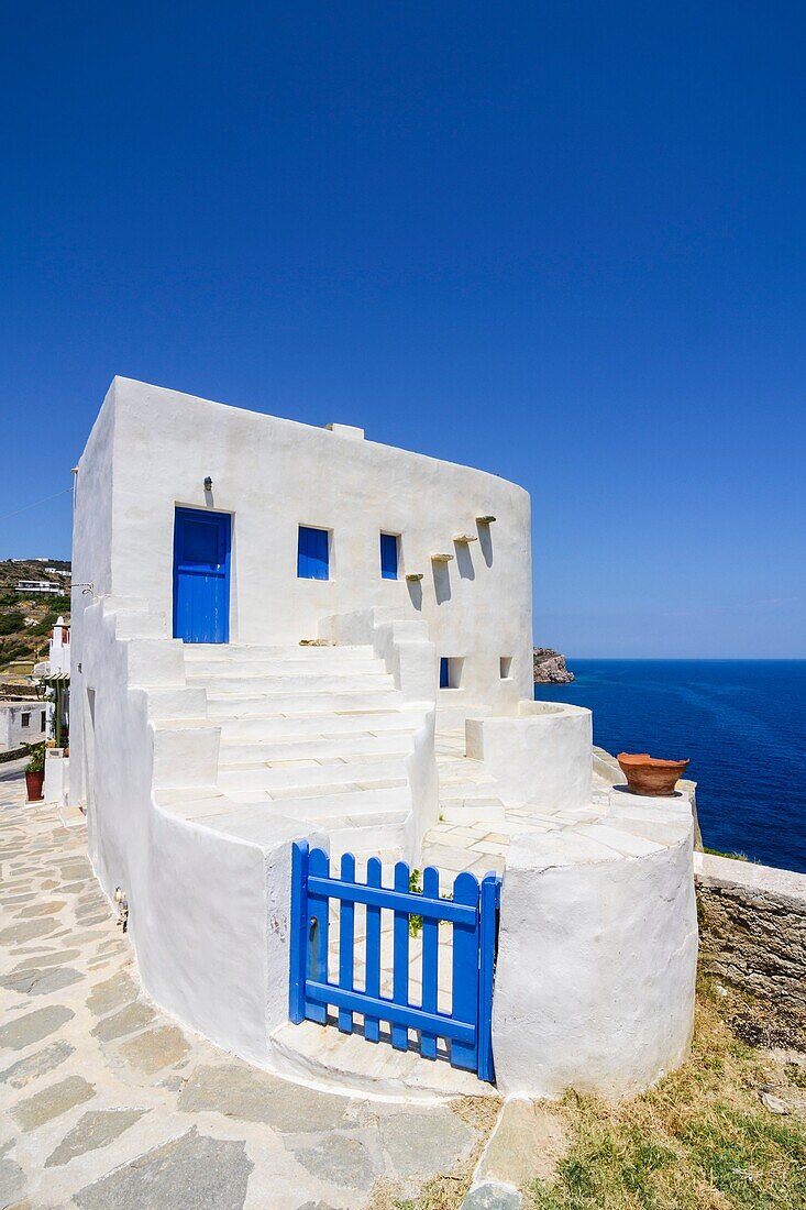 White washed house overlooking the Aegean Sea on Sifnos Island, Cyclades, Greece.