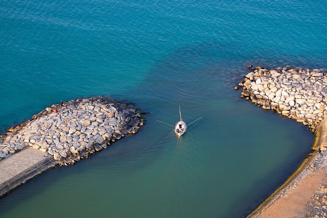 Aerial view picture. Llaut in the S'oberta canal in Alcudia, Mallorca, Balearic Island, Spain.